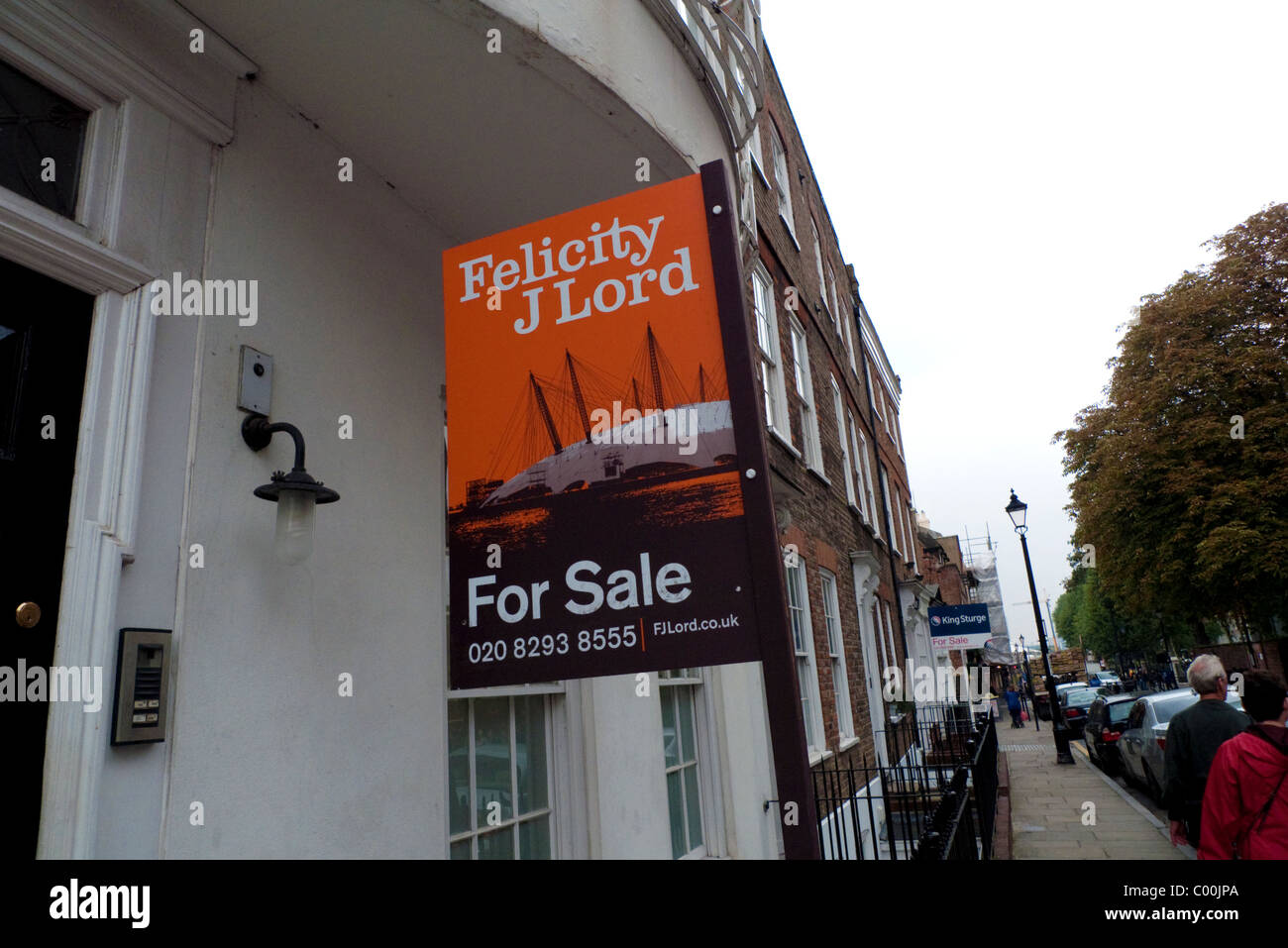 Property for Sale sign on a row of terraced housing in Greenwich London England UK KATHY DEWITT