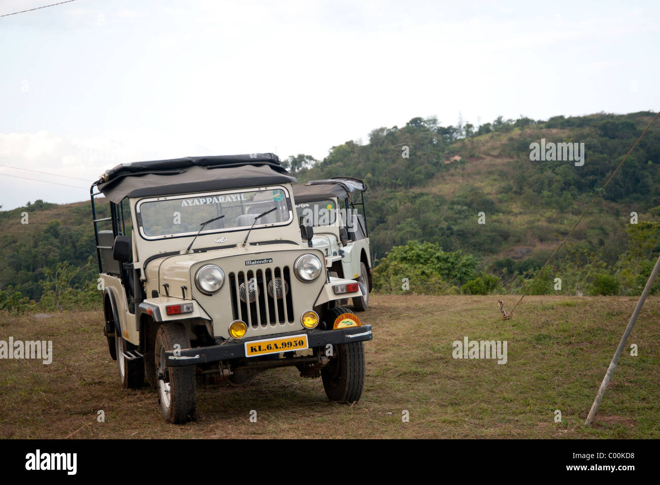 Multiple 4 wheel drive (4WD) vehicles on top of a hill near Thekkary,  in the state of Kerala in India Stock Photo