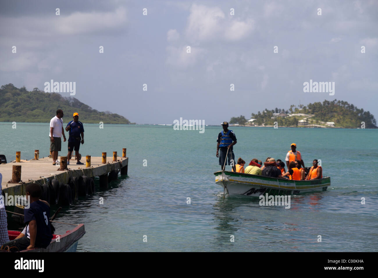 Tourists arriving to La Guaira from Isla Grande. Colon, Republic of Panama, Central America Stock Photo