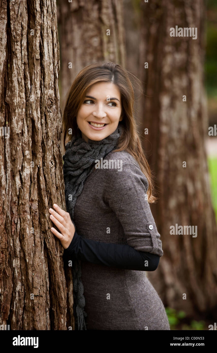 Premium Photo | Attractive african american girl posed at cafe against tree
