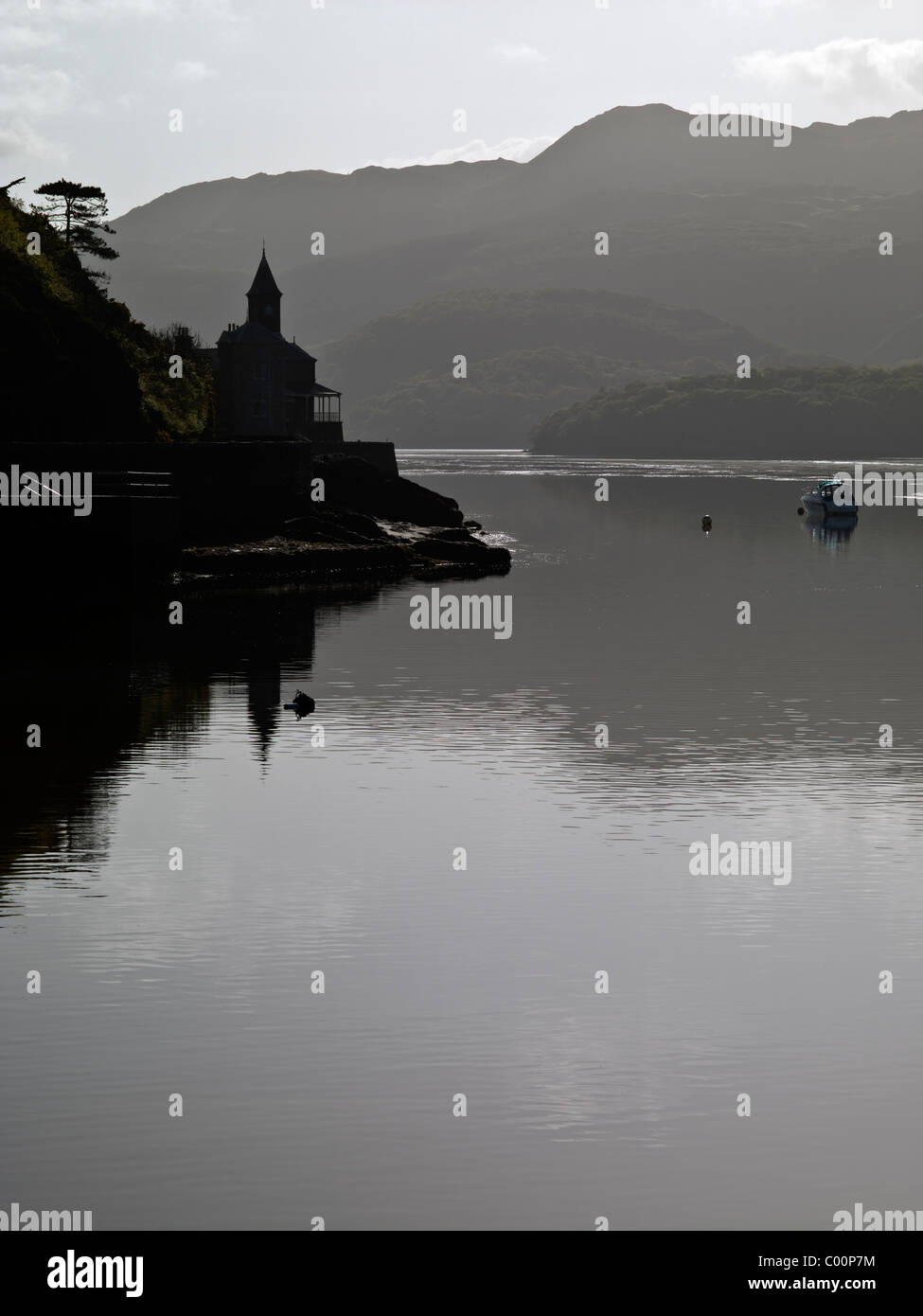 A moody silhouette of Clock Tower House (Coes Faen), Barmouth Estuary