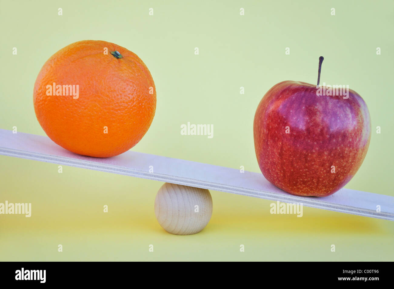 Apples and oranges comparison concept Stock Photo Alamy