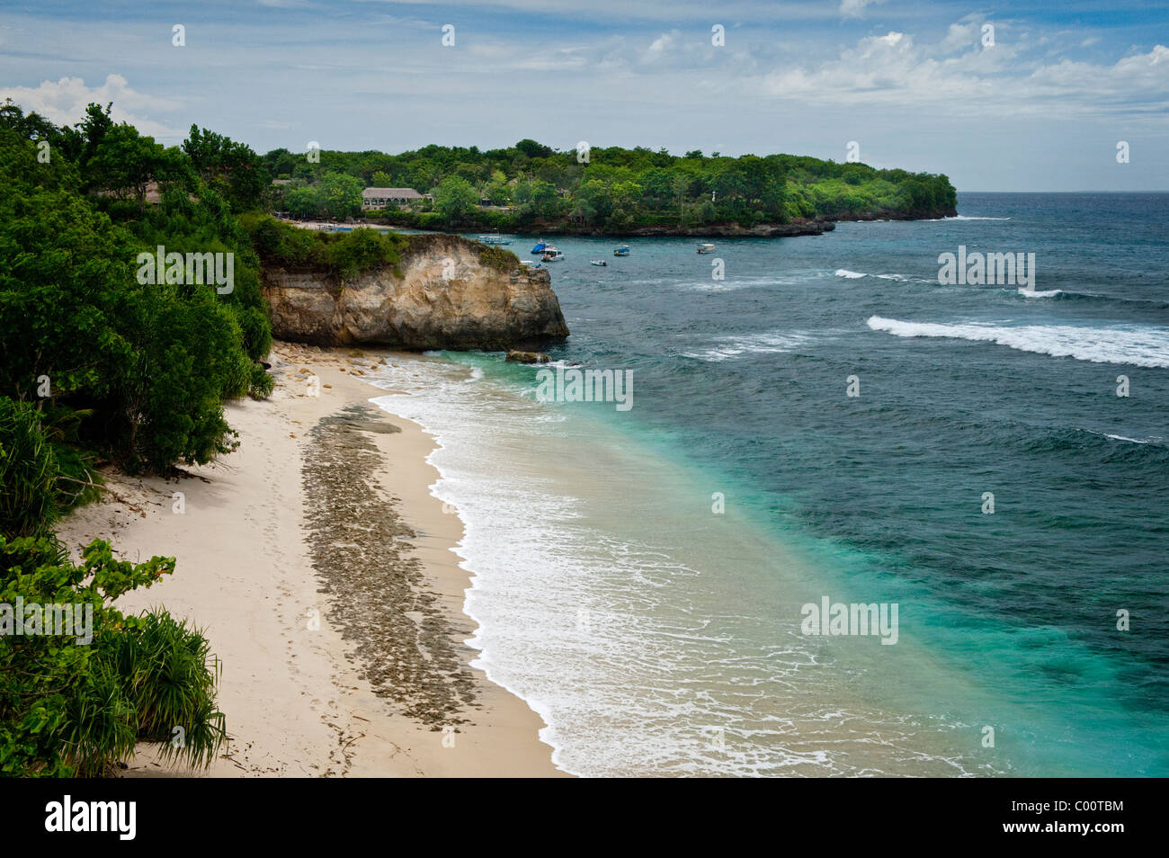 Mushroom Bay is a beautiful secluded white sand beach on Nusa Lembongan, a short distance from mainland Bali, Indonesia. Stock Photo