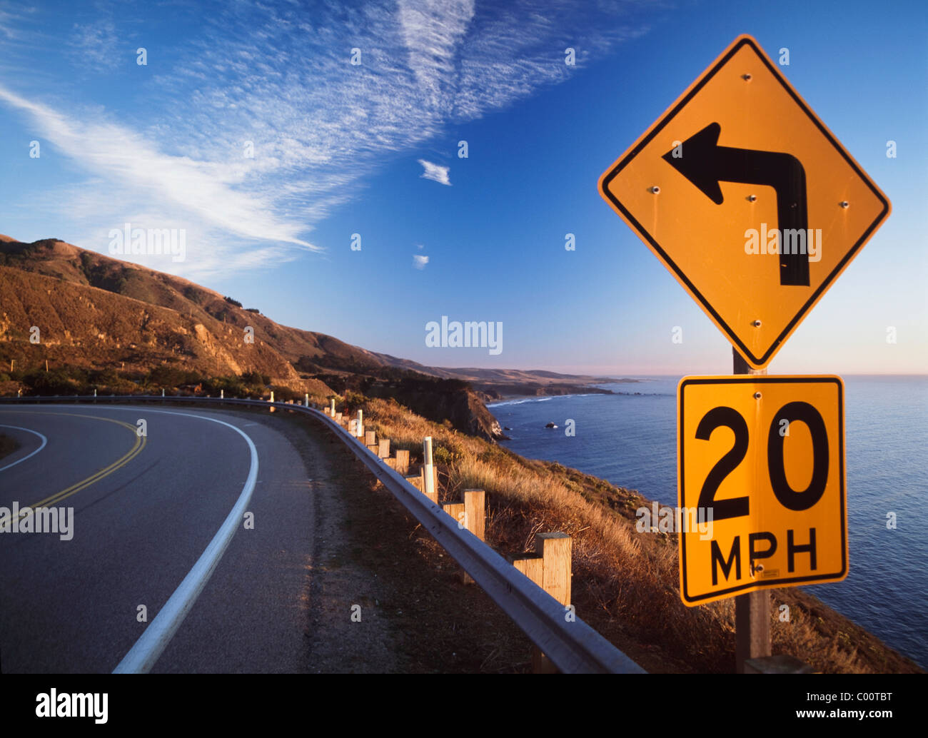 20mph road sign on corner of Route 1 at Big Sur Stock Photo