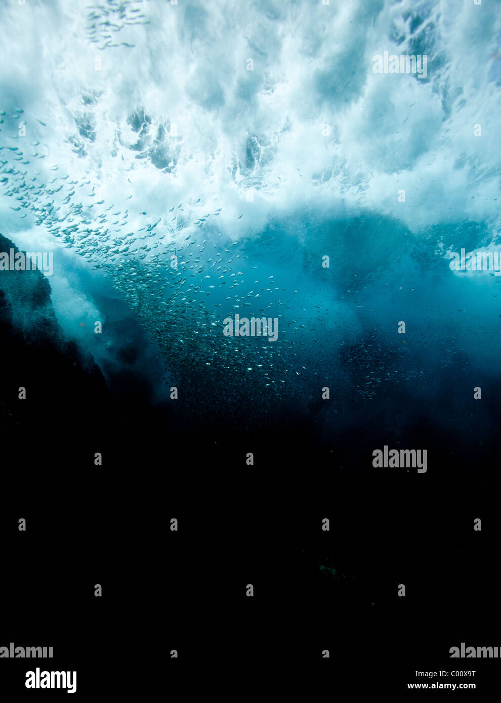 Underwater view of crashing waves Stock Photo