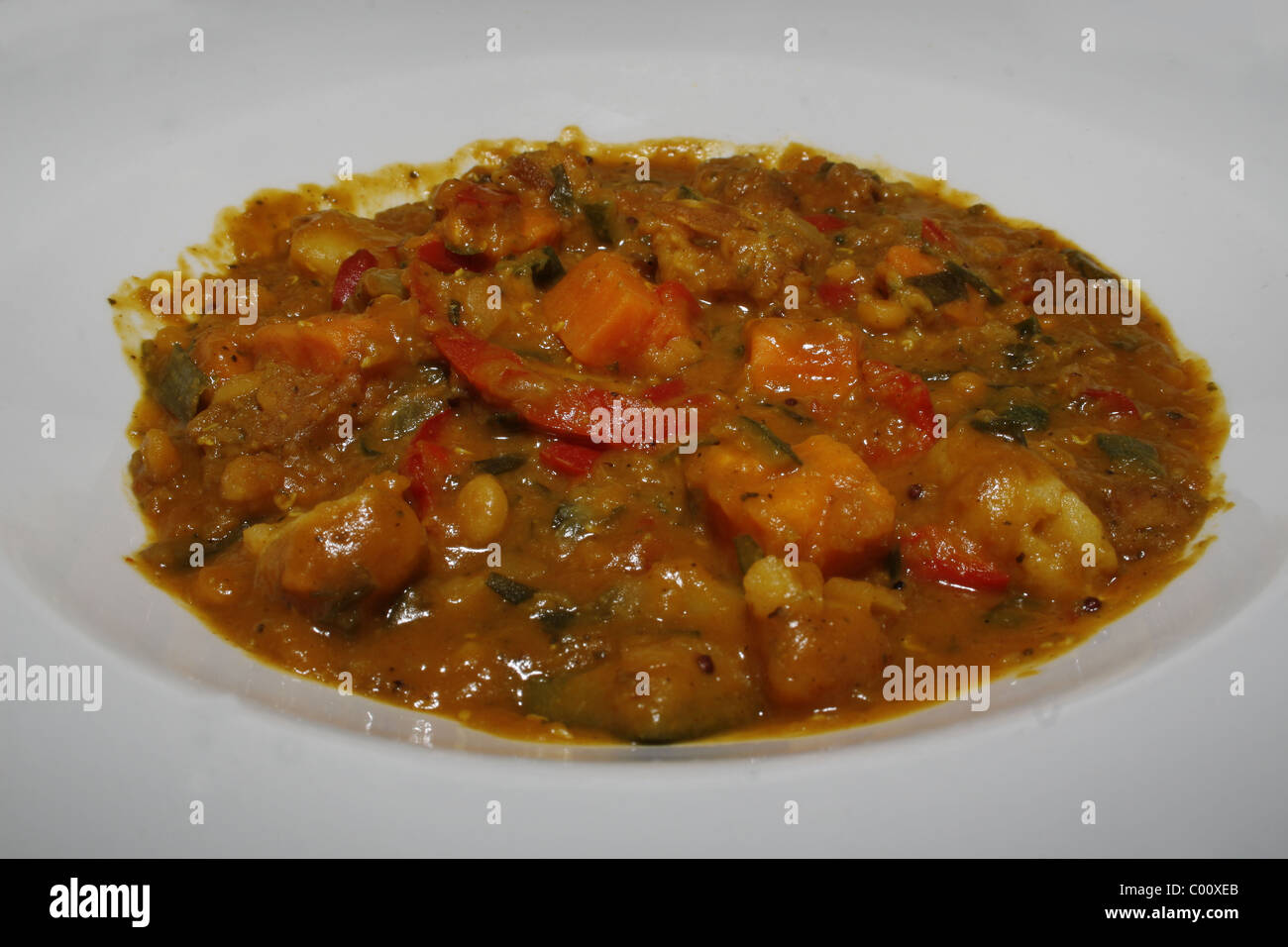 vegetable dhansak on plate Stock Photo Alamy