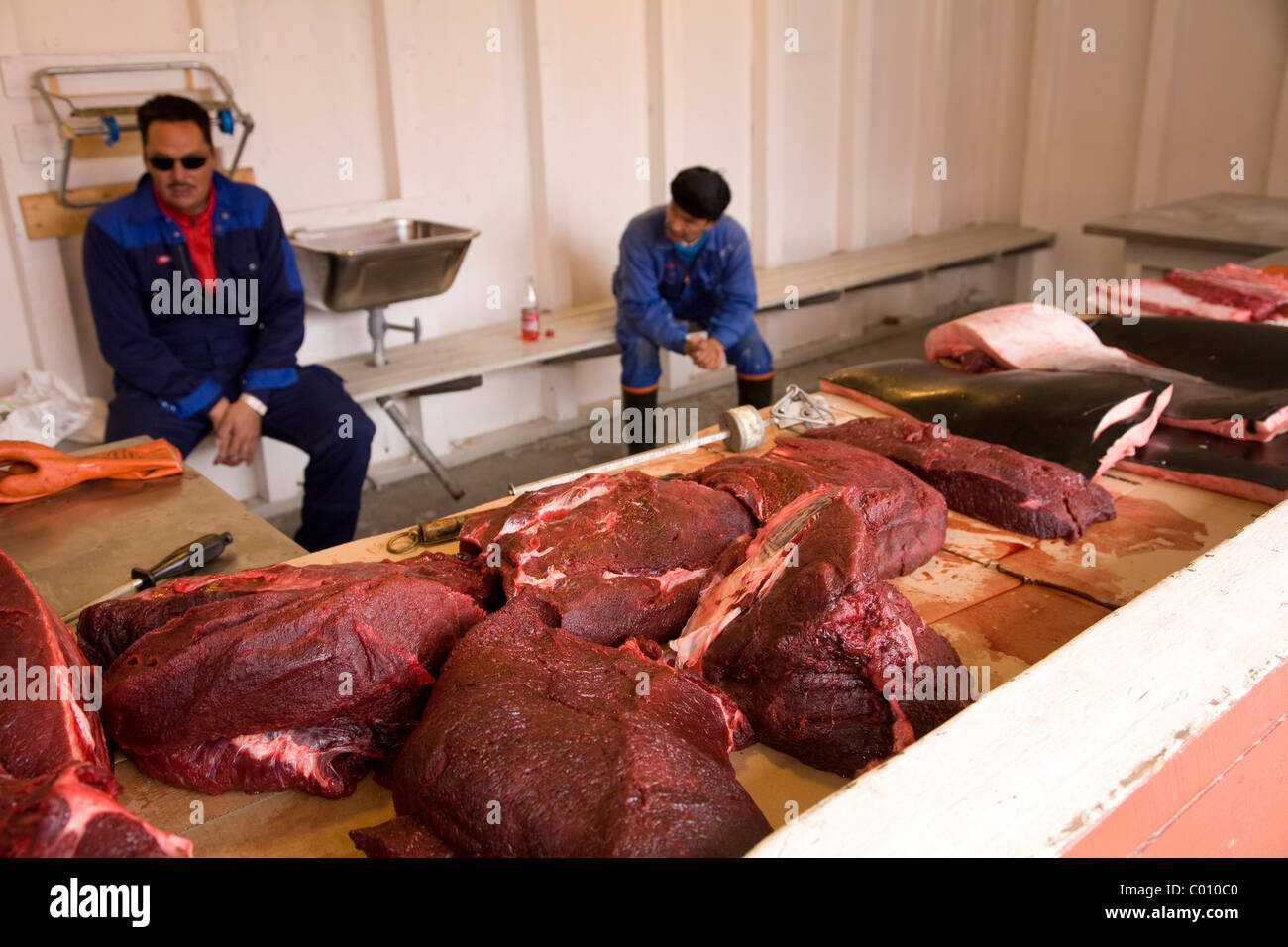 A traditional staple of the Inuit diet, whale meat (Minke in this instance) is sold at this stand in Qeqertarsuaq, Greenland Stock Photo