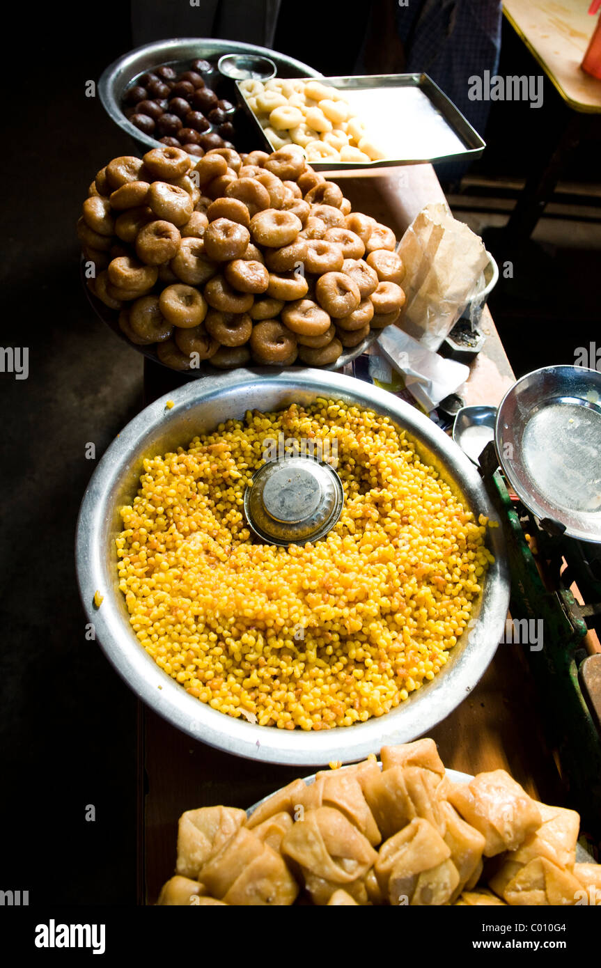 Indian snacks sold in a small road restaurant in Orissa Stock Photo - Alamy