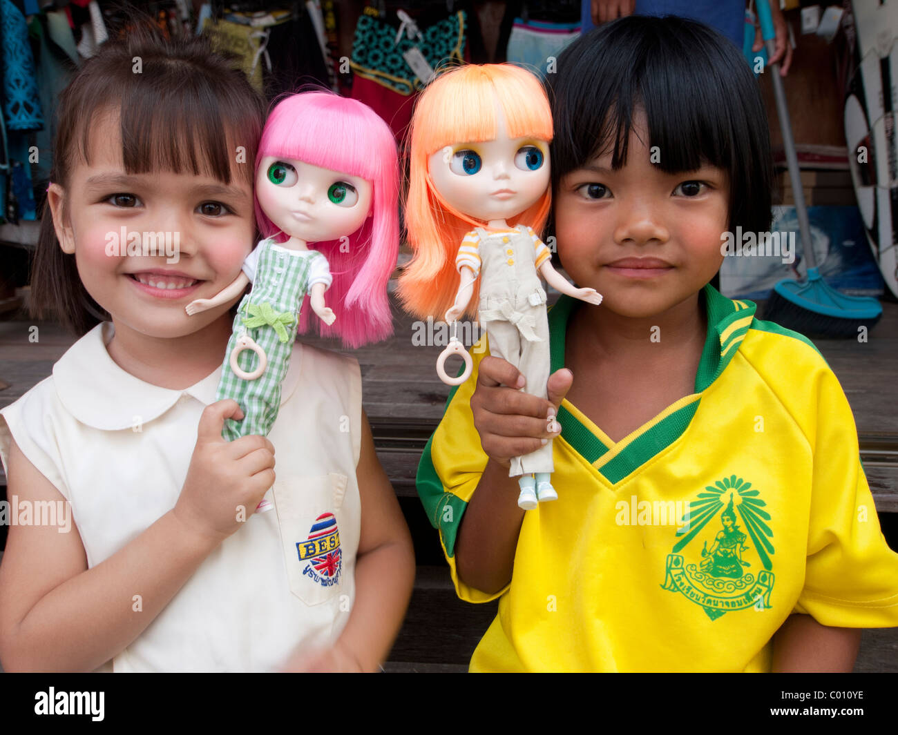 Girls playing with dolls Stock Photo