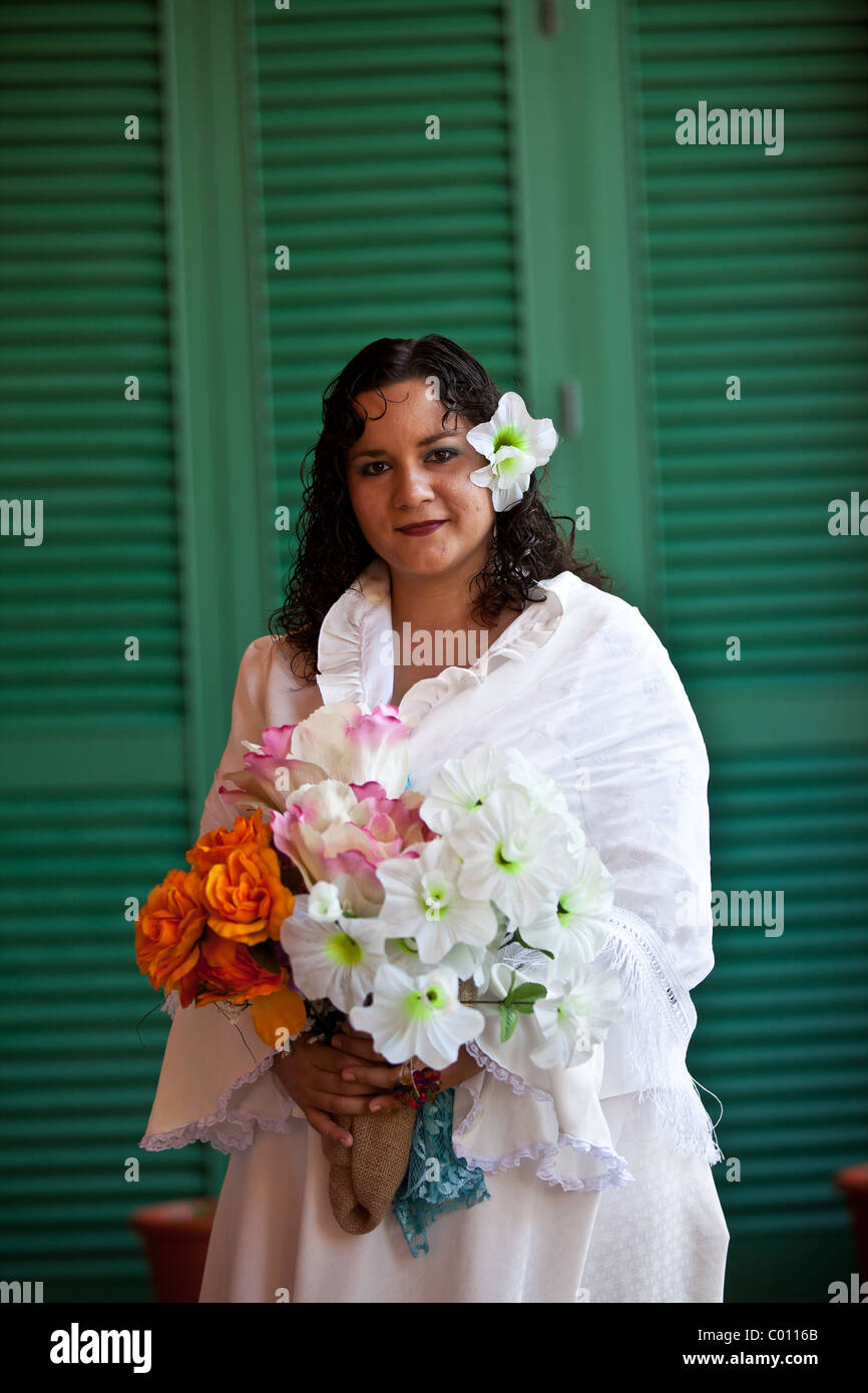 A woman dressed in traditional Puerto Rican costume San Sebastian Festival in San Juan, Puerto Rico. Stock Photo