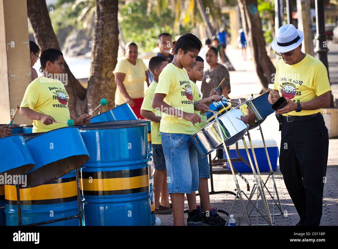 School children from the Vieques Island steel drum band perform along the waterfront in Vieques Island, Puerto Rico. Stock Photo