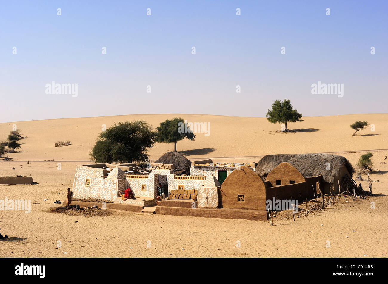 Typical traditional farmhouse with painted walls in the Thar Desert, Rajasthan, India, Asia Stock Photo