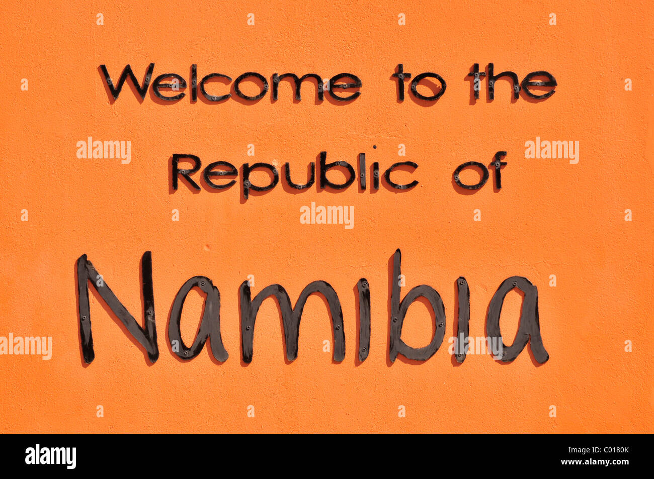 Text 'Welcome to the Republic of Namibia' at Namibian-South African border Mata-Mata, Kgalagadi Transfrontier Park, Kalahari Stock Photo