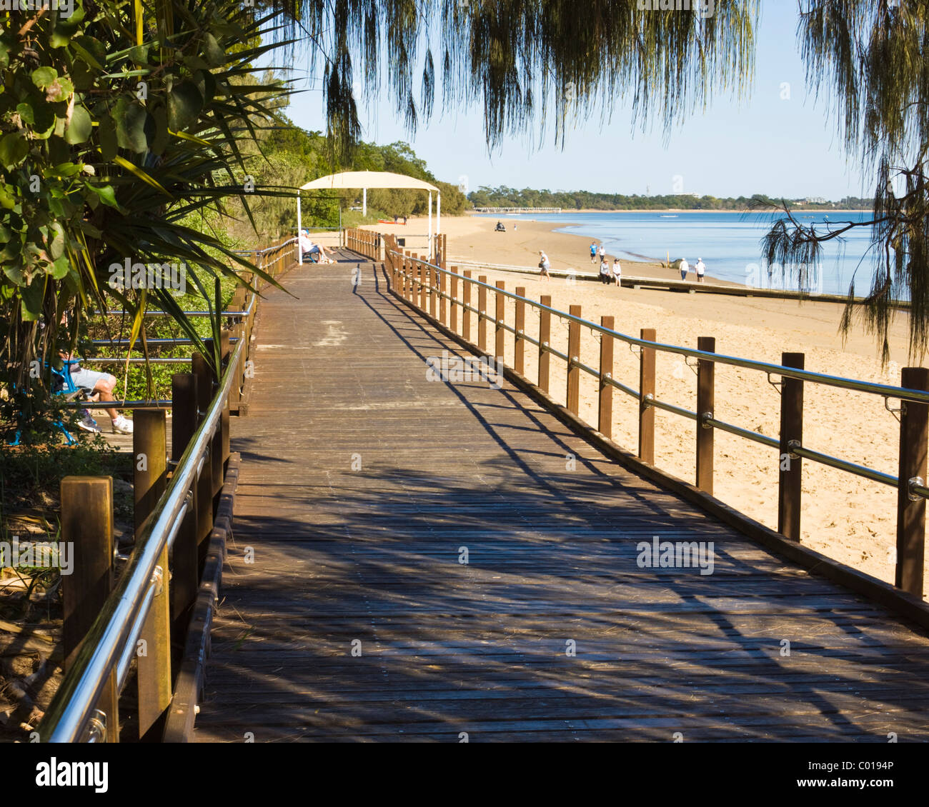 Boardwalk near family beach at Harvey Bay Stock Photo Alamy