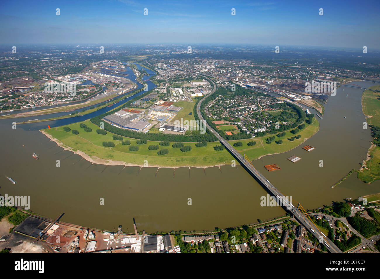 Aerial view, bend of the Rhine river, Beekerswerth district, Thyssen Krupp steel plant site, Rheinbruecke bridge Stock Photo