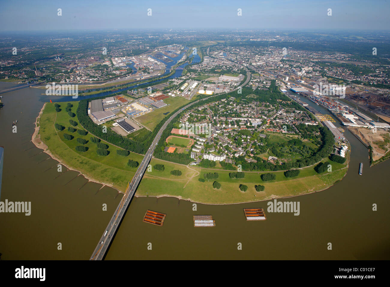 Aerial view, bend of the Rhine river, Beekerswerth district, Thyssen Krupp steel plant site, Rheinbruecke bridge Stock Photo