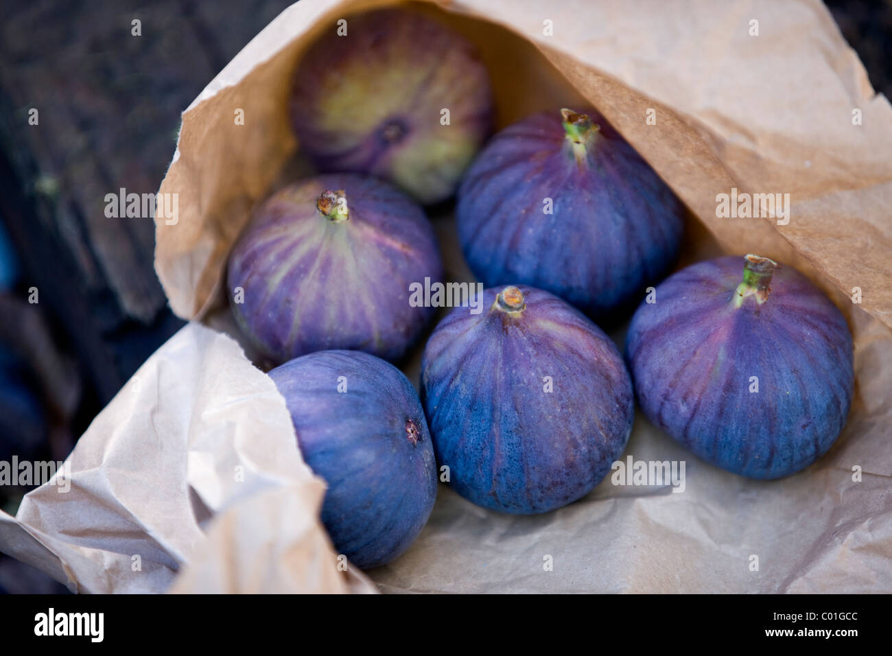 Six ripe figs in a brown paper bag Stock Photo Alamy
