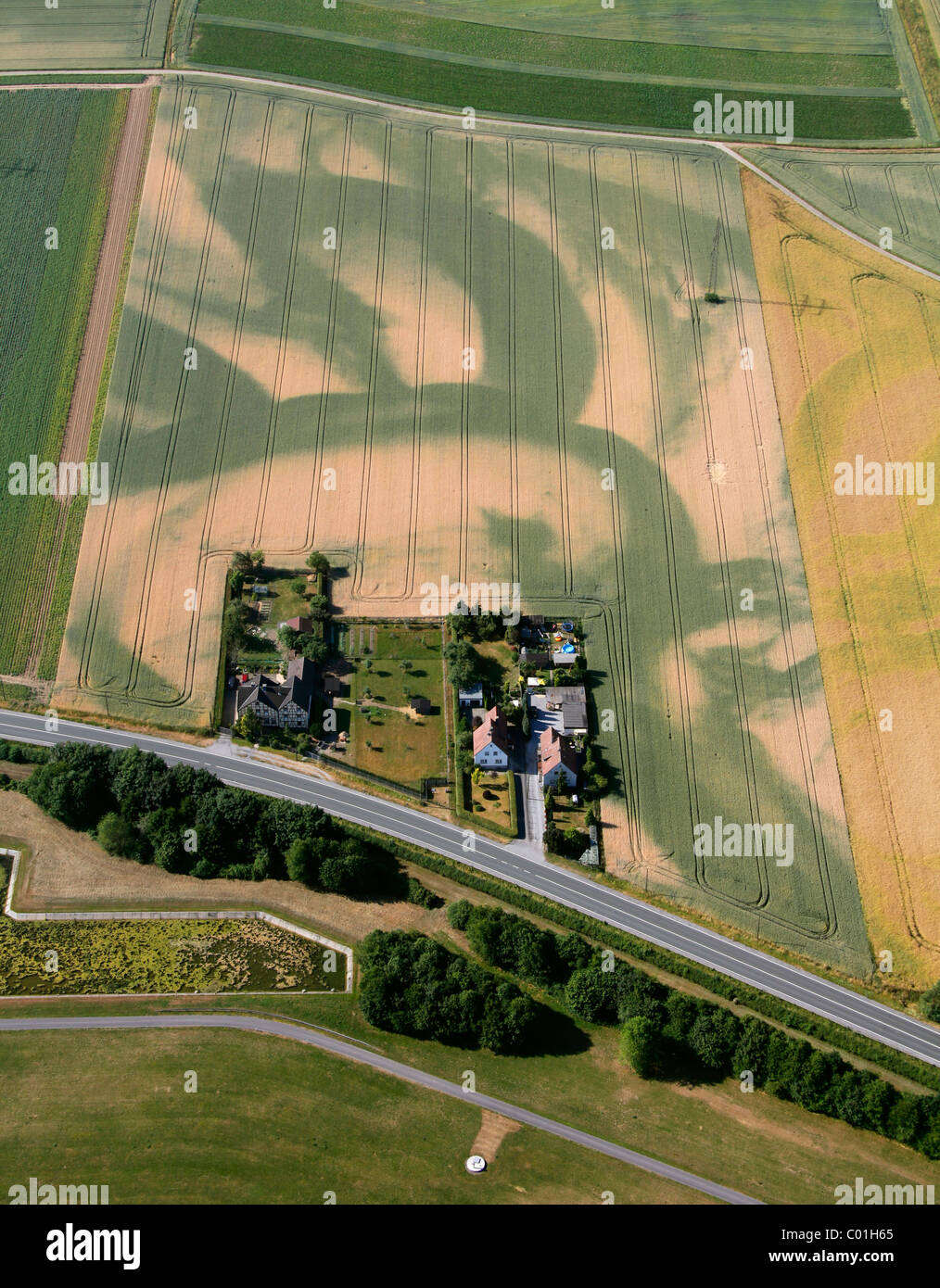 Aerial view, isolated farm, structures on a field, salt structures on a field, Froendenberg, Ruhr river, Ruhrgebiet area Stock Photo