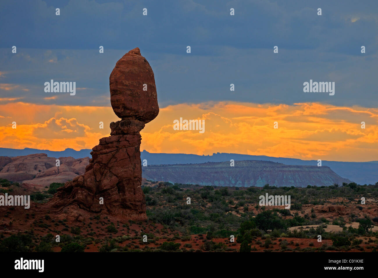 Balanced Rock at sunset with an oncoming thunderstorm, Arches National Park, Utah, Southwest, USA Stock Photo