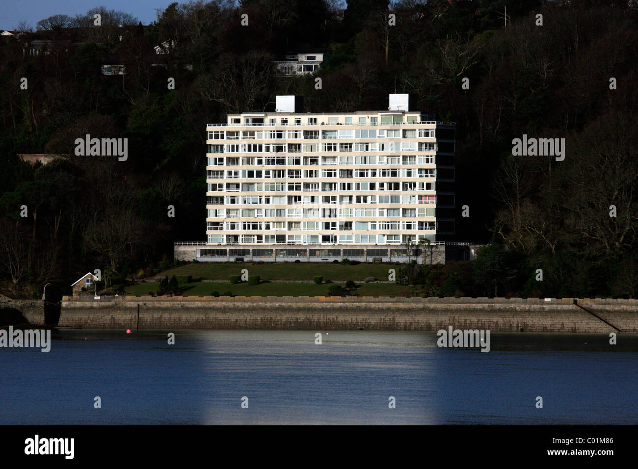 Block of flats overlooking the Menai Straits, Anglesey, North Wales Stock Photo