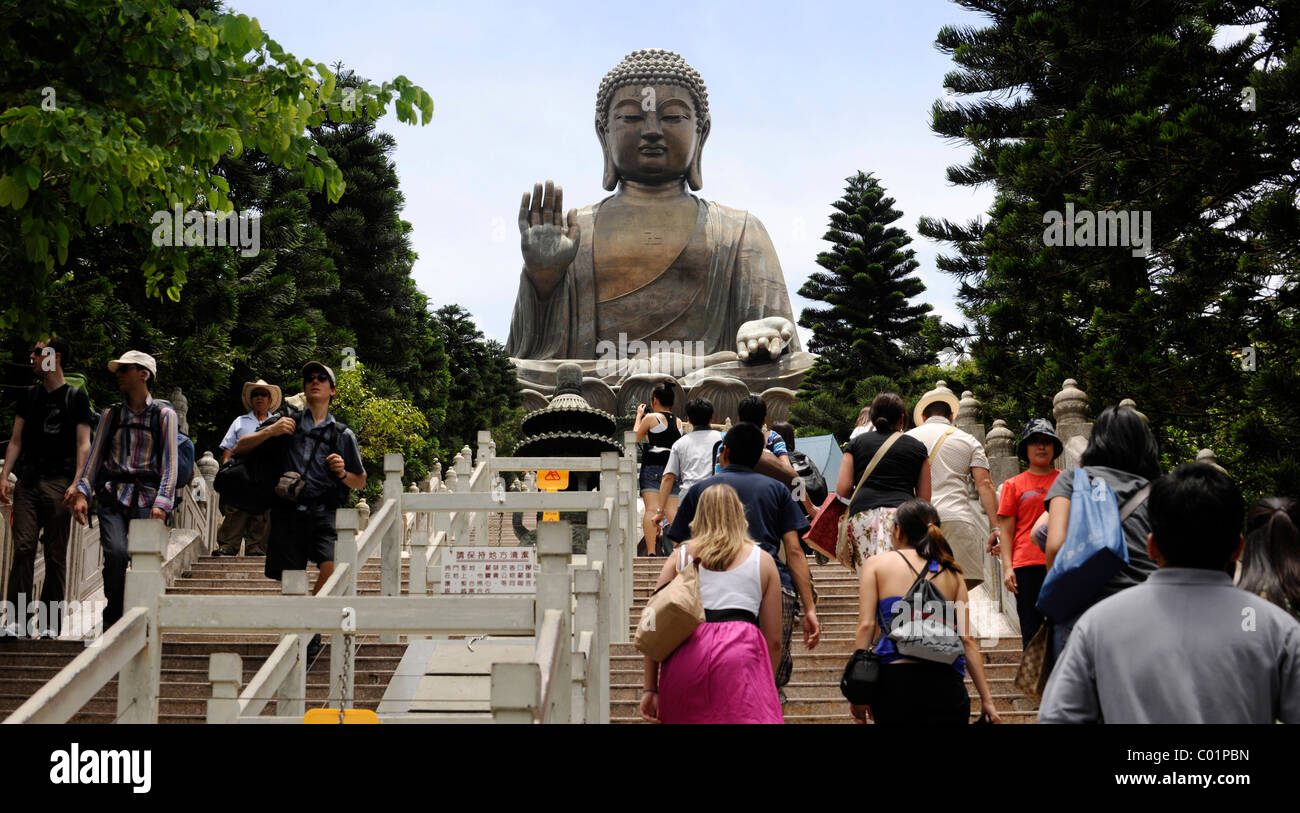 Tourists at Tian Tan Buddha or Big Buddha statue, Hong Kong, China