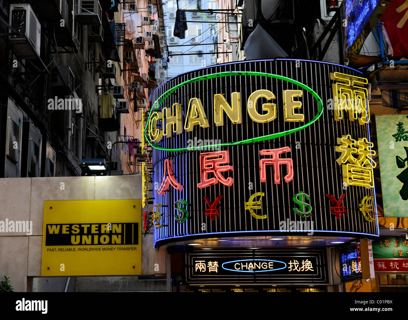 Advertisement for a money exchange office and Western Union, Hong Kong, China, Asia Stock Photo