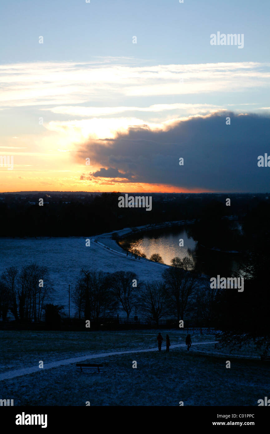 Wintry view at dusk of the River Thames at Glover's Island from the top of Richmond Hill, Richmond, London, UK Stock Photo