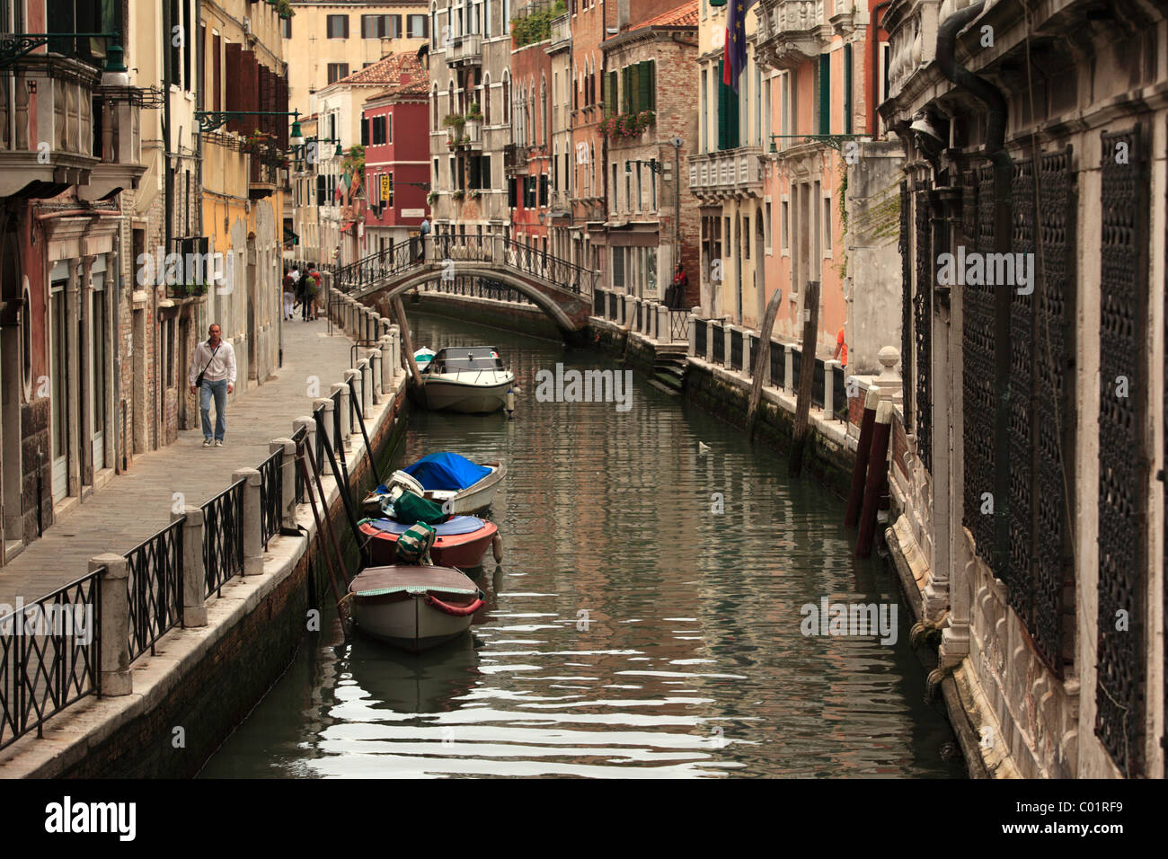 Venetian canal boats arched hi-res stock photography and images - Alamy