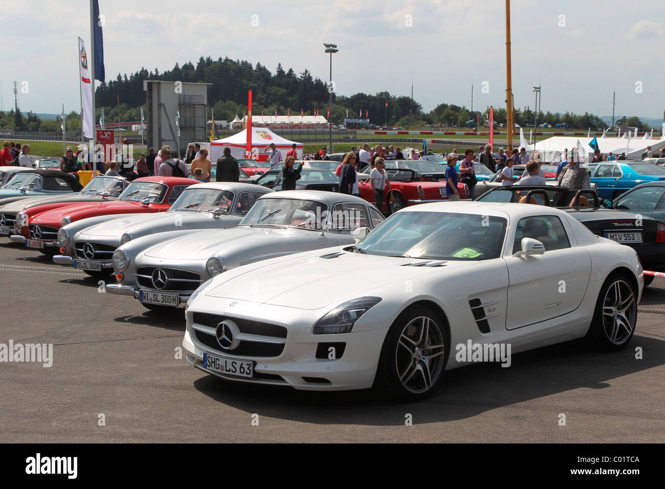 Mercedes SLS next to Mercedes 300 SL gullwing, Oldtimer-Grand-Prix 2010 for vintage cars at the Nurburgring race track Stock Photo