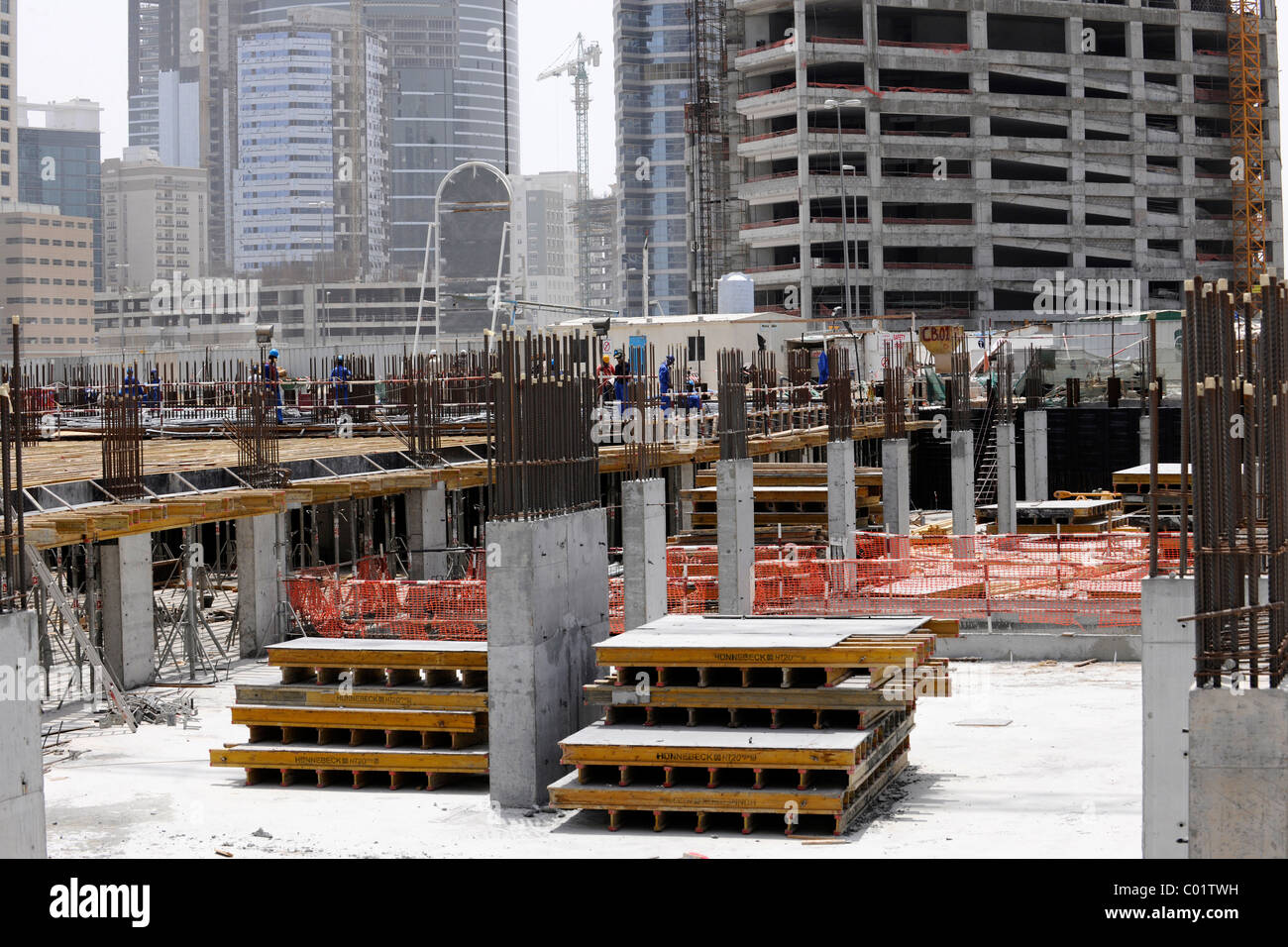 Construction workers on a large construction site, Dubai, United Arab Emirates, Middle East Stock Photo