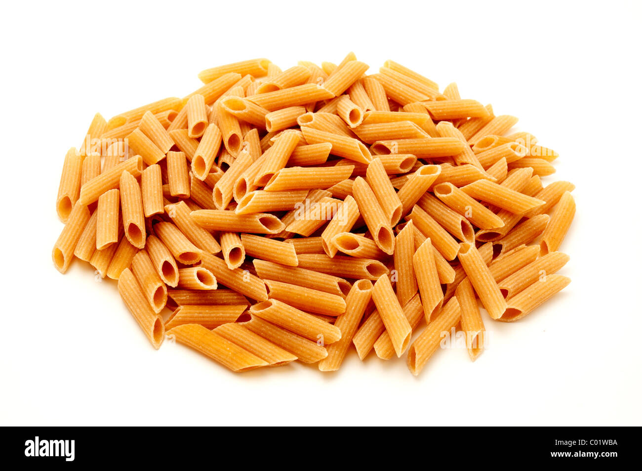 Wholemeal pasta on a white background Stock Photo