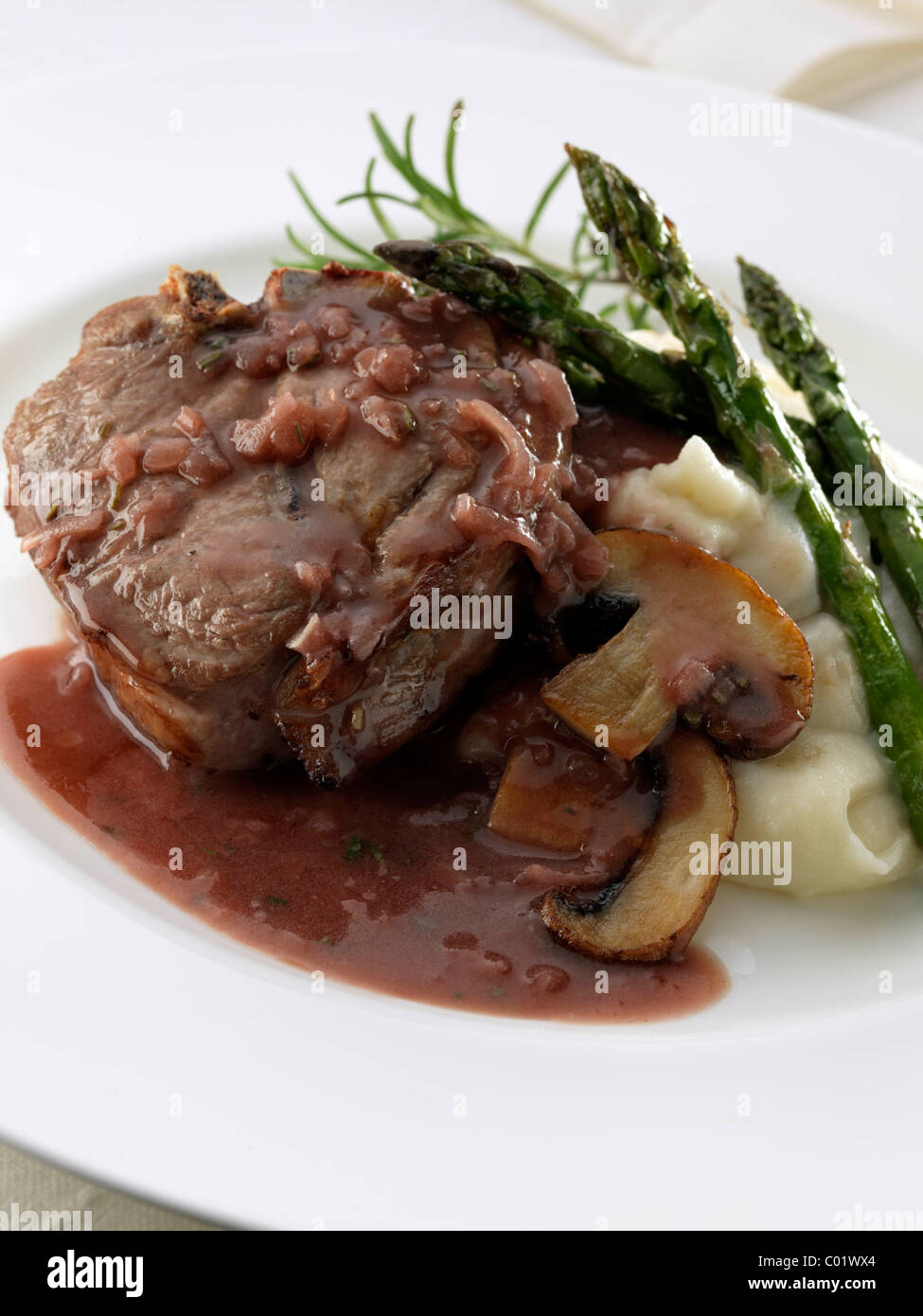 Lamb chop with asparagus mushrooms and mashed potato Stock Photo Alamy