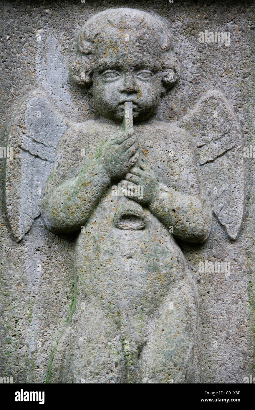 Cemetery, angel with flute Stock Photo