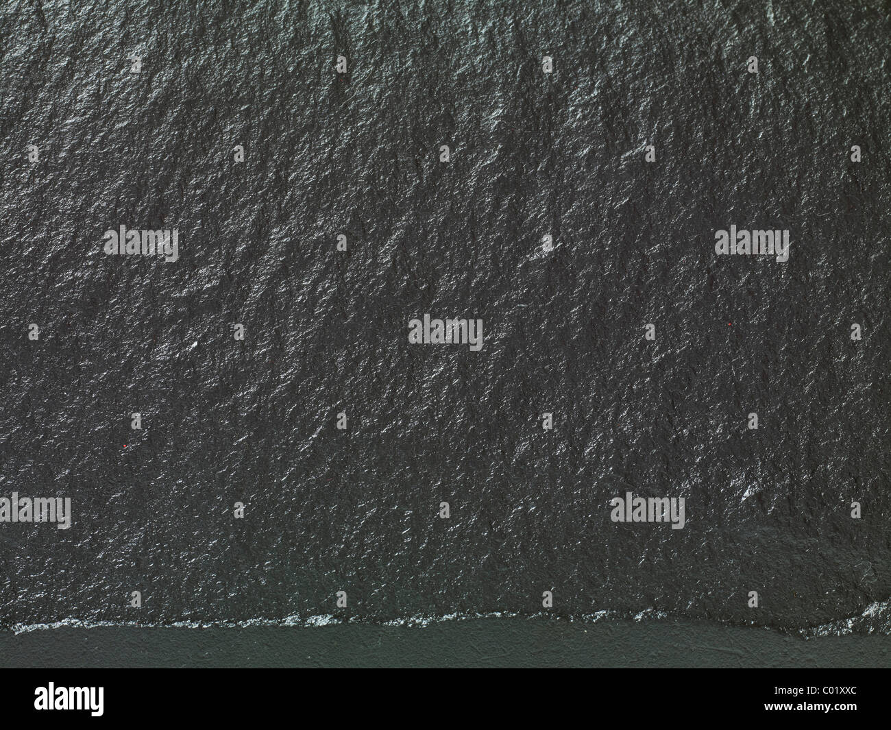stone texture in a piece of slate dark grey black Stock Photo Alamy
