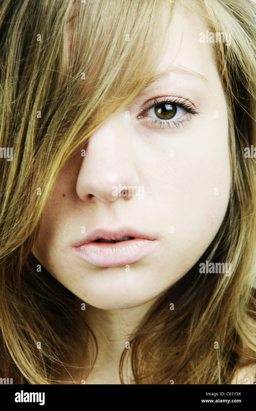 Portrait of a young woman with long hair Stock Photo - Alamy