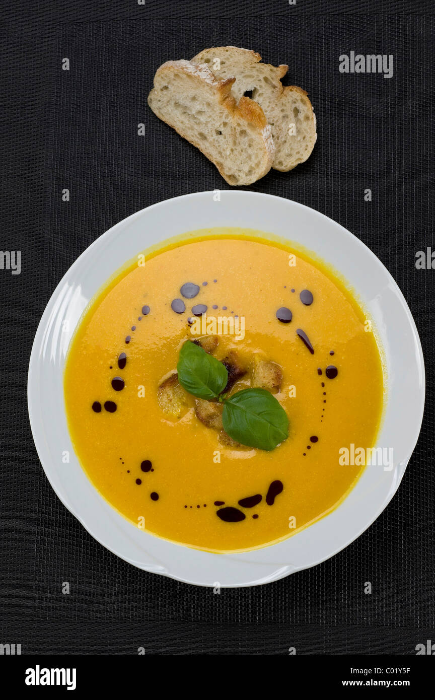 Pumpkin cream soup with croutons Stock Photo