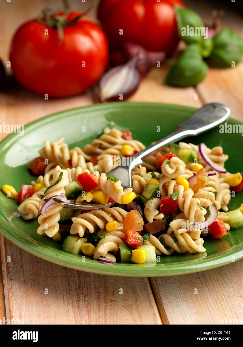 Individual portion of vegetarian spelt pasta salad Stock Photo