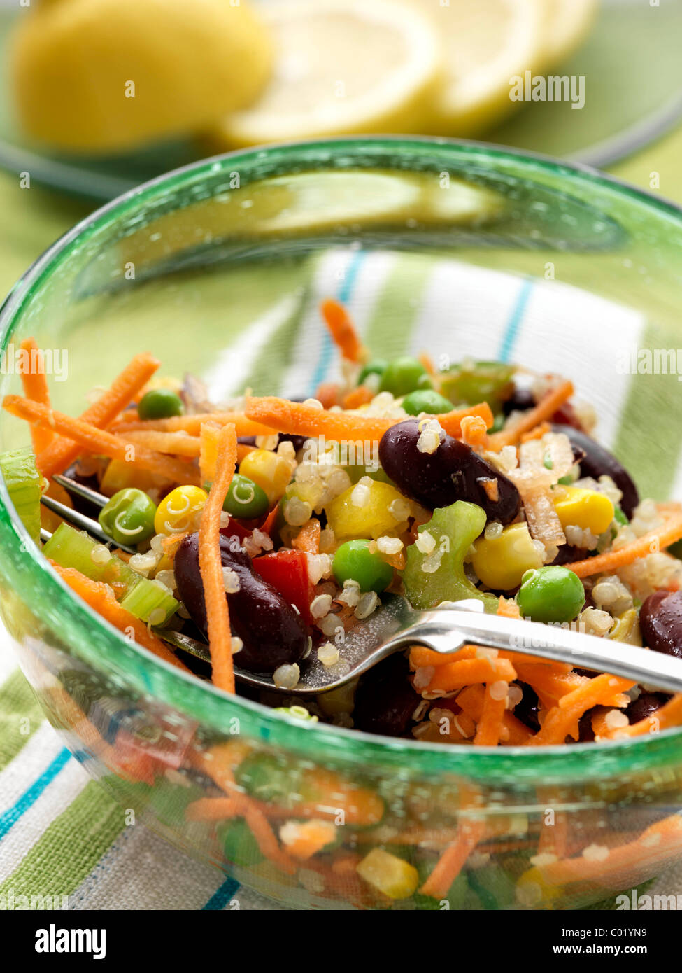 Vegetarian quinoa salad with peas carrots celery red kidney beans Stock Photo