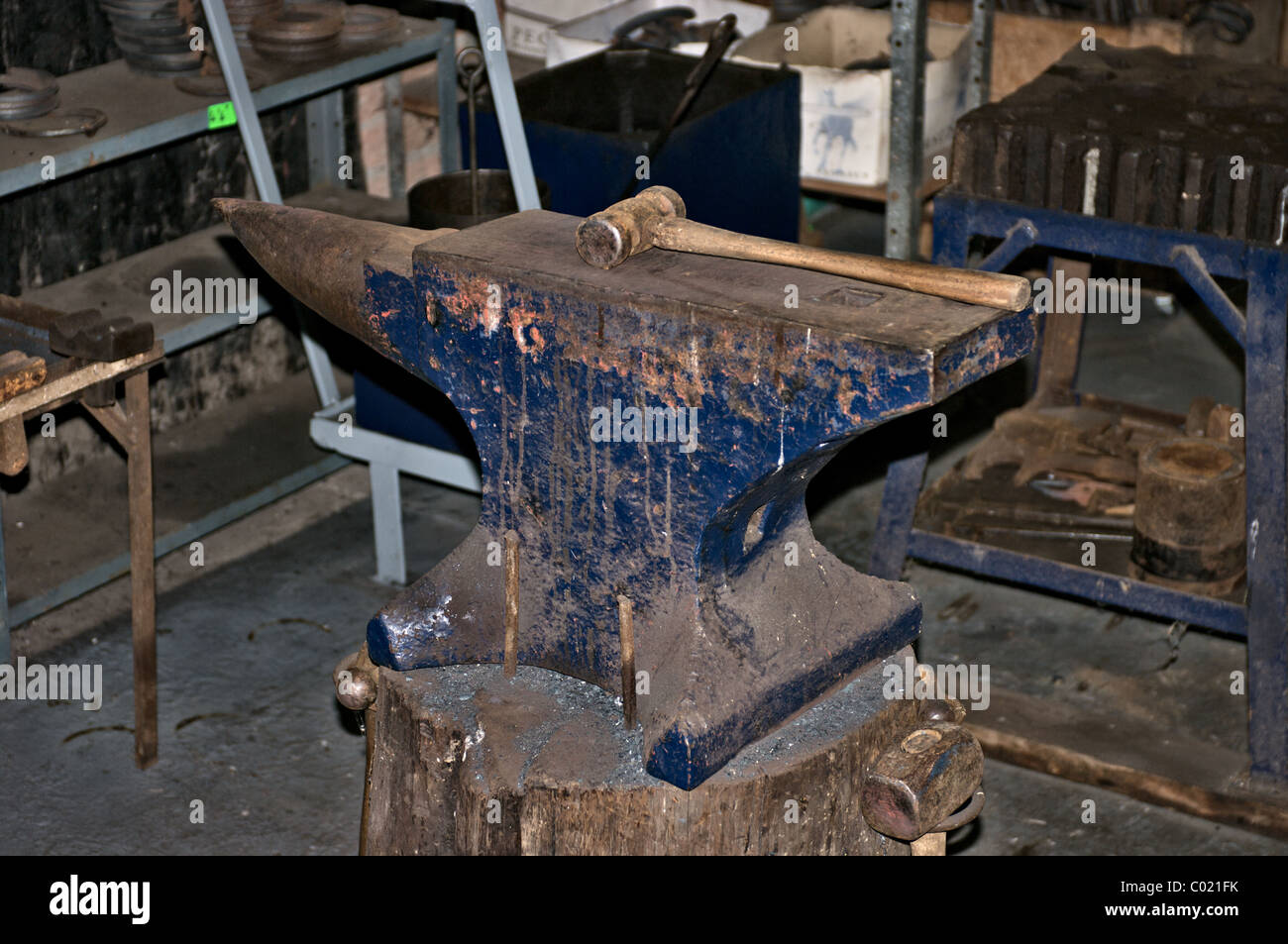Hammer on anvil Stock Photo Alamy