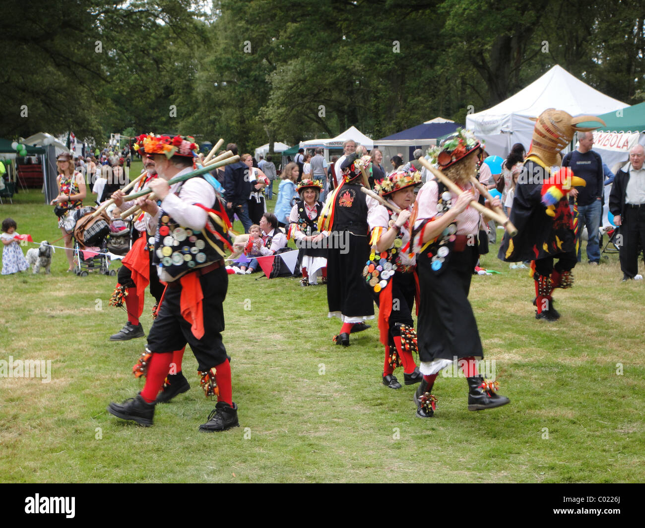 Mixed gender Morris Dancers at an English town fête Stock Photo