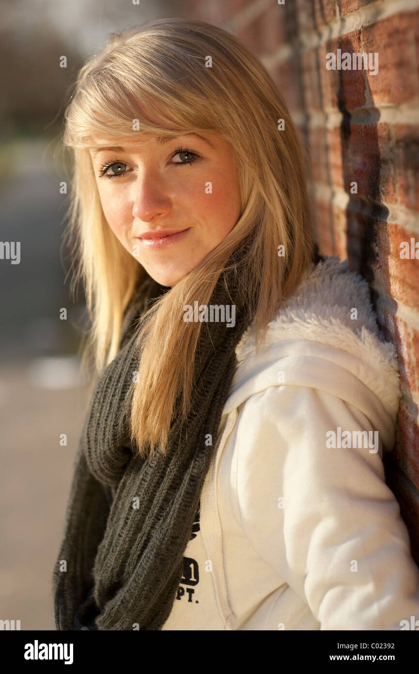 A slim blonde 14 15 16 year old teenage girl, UK Stock Photo