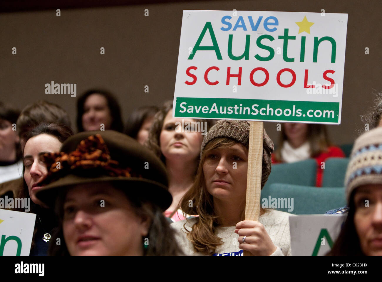 Parents of Texas public school students at a rally at the Capital to call attention to lawmakers' plans to cut school funding Stock Photo