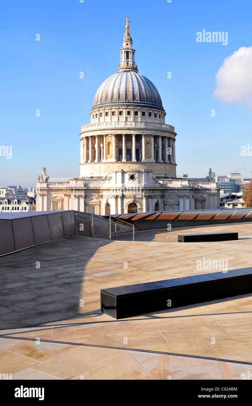 One New Change shopping centre roof terrace & dome of historical iconic St Pauls cathedral european church landmark blue sky day in City of London UK Stock Photo