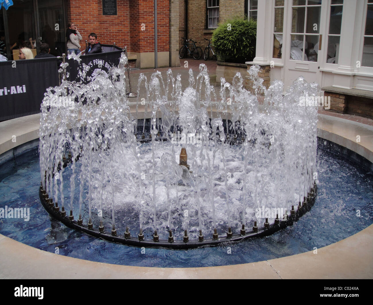 Water fountain in square in Cambridge Stock Photo