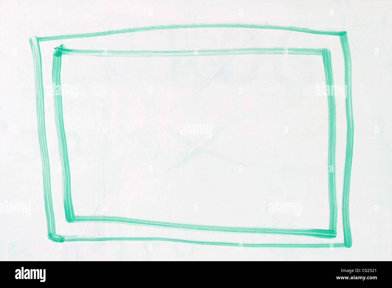 box with double outline in green dry erase marker on a used white board Stock Photo