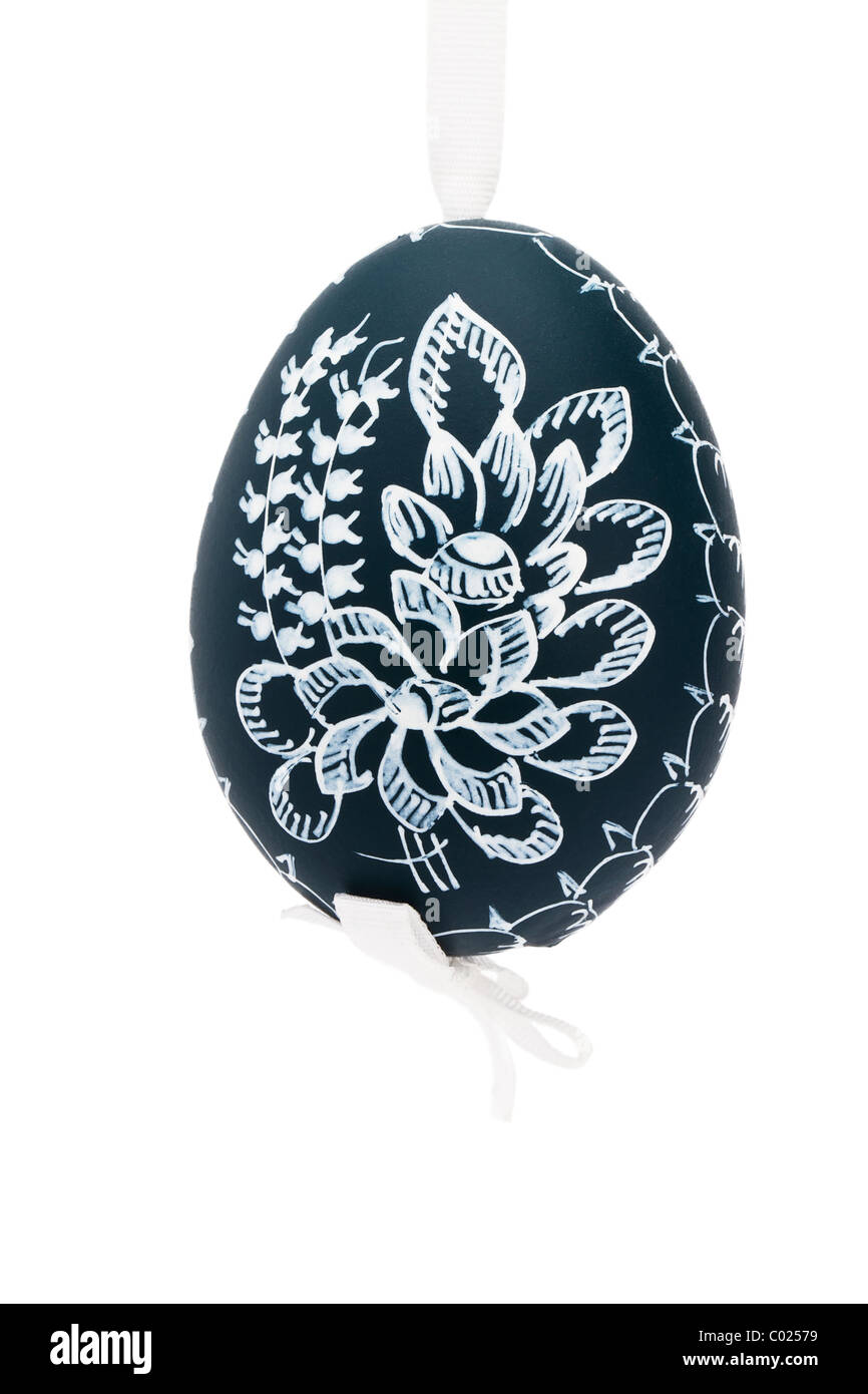 dark green hanging hand painted easter egg on white background Stock Photo