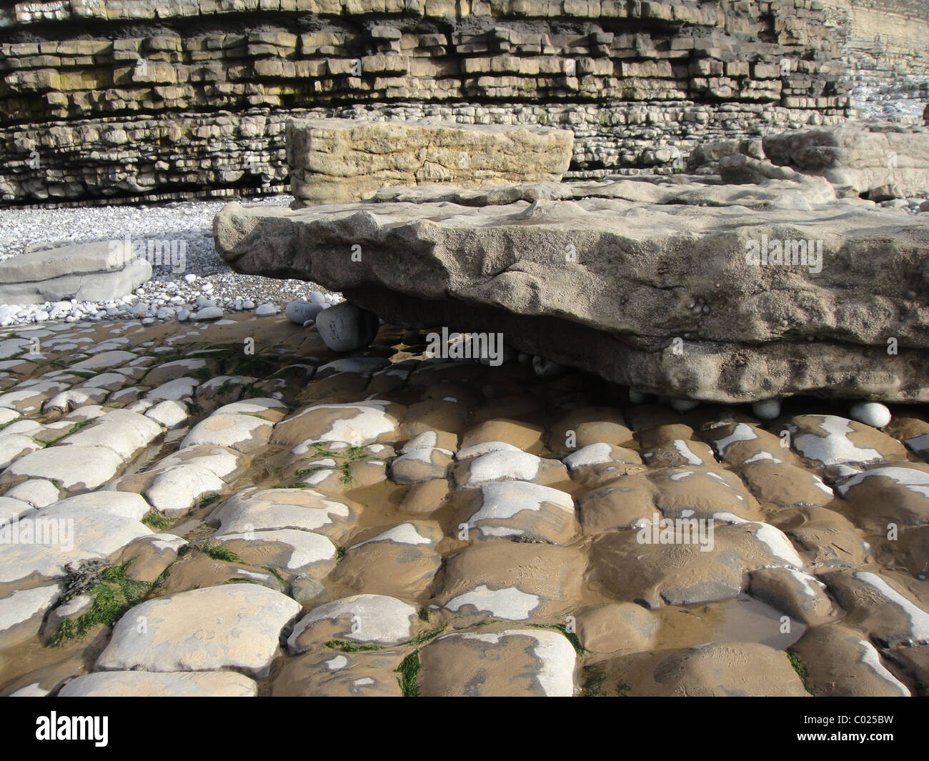 Rocks on beach in Wales Stock Photo