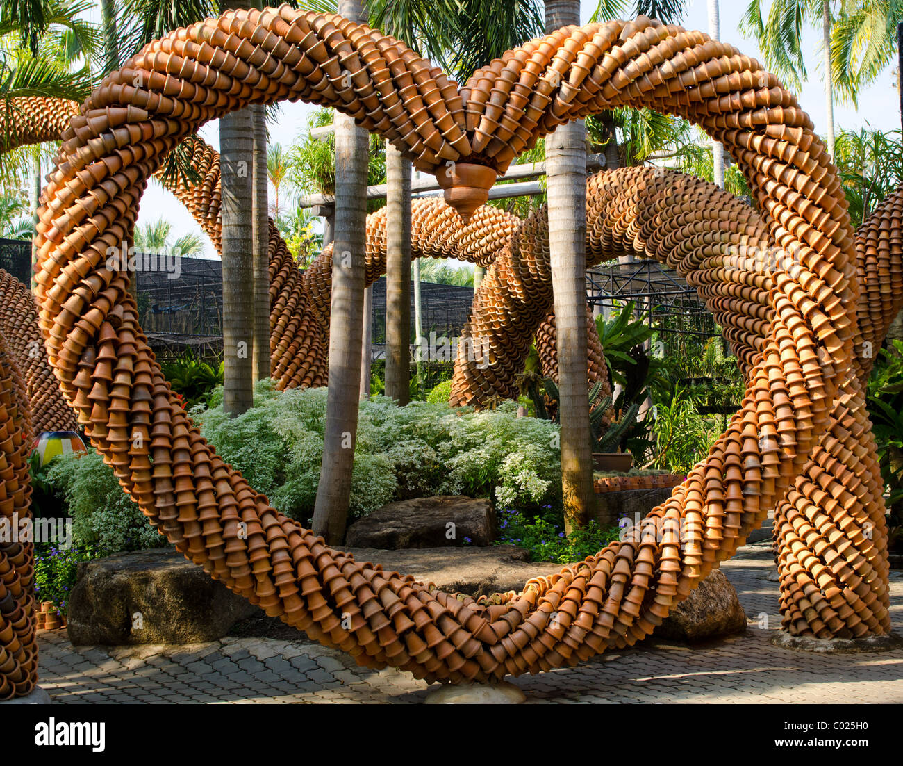 Unique heartshaped garden arch made entirely from terracotta plant