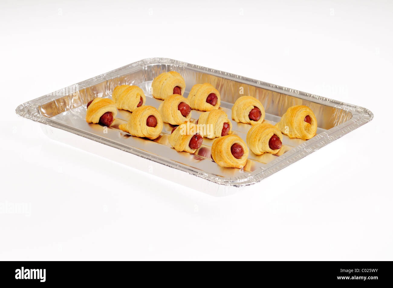 Pigs in a Blanket on baking tray on white background, cutout Stock Photo Alamy