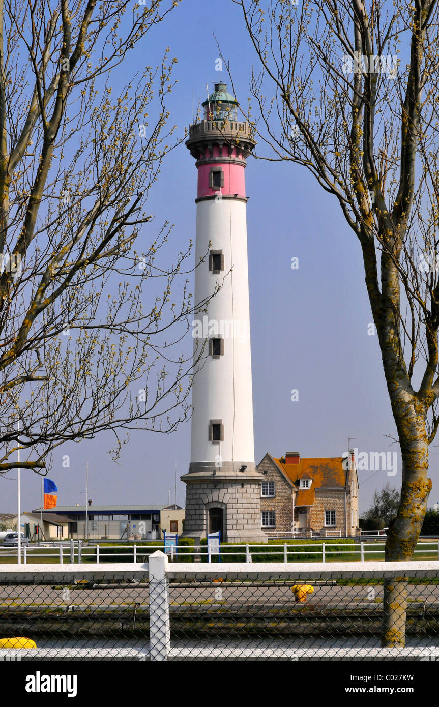 Lighthouse of Ouistreham between two trees, in the Calvados department in the Basse-Normandie region of France Stock Photo
